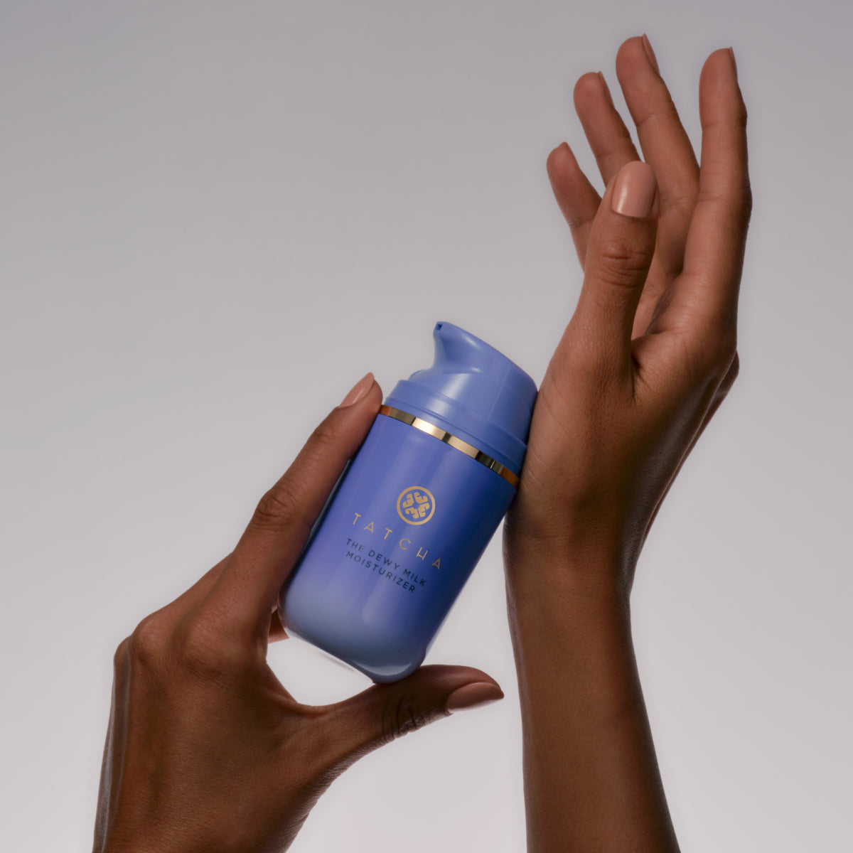 DewyMilkMoisturizer-Aug26-Ppage-HandHold_2c644235-b839-408b-823b-7ec7e75b22c0.jpg