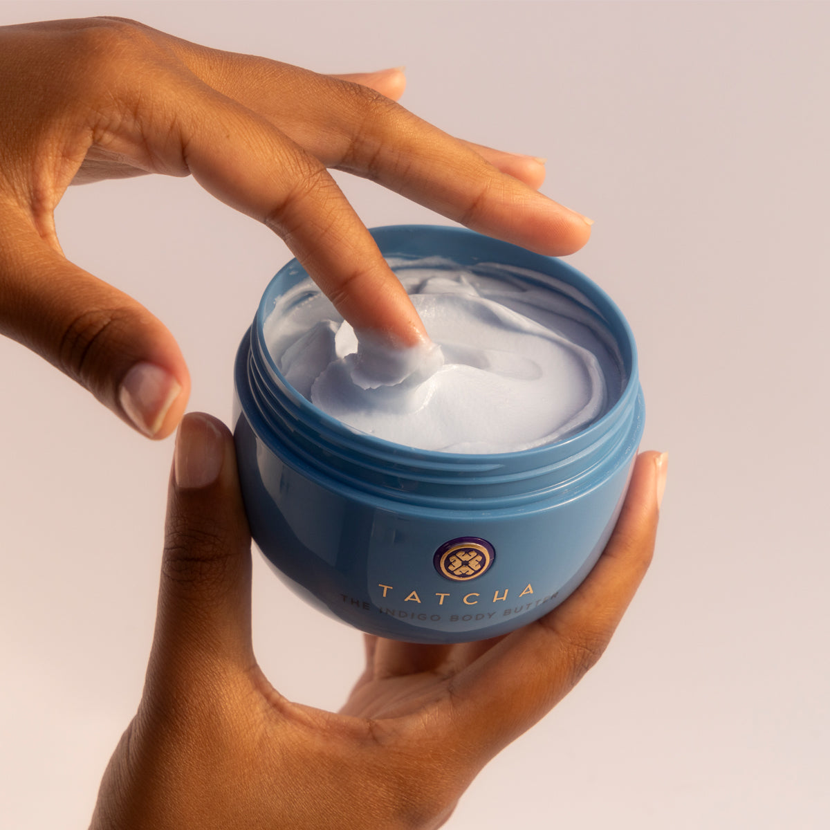 IndigoBodyButter-pdp-Model-Hand-1200x1200_168cf70f-73bf-4126-88ba-38aea4b89e4d.jpg